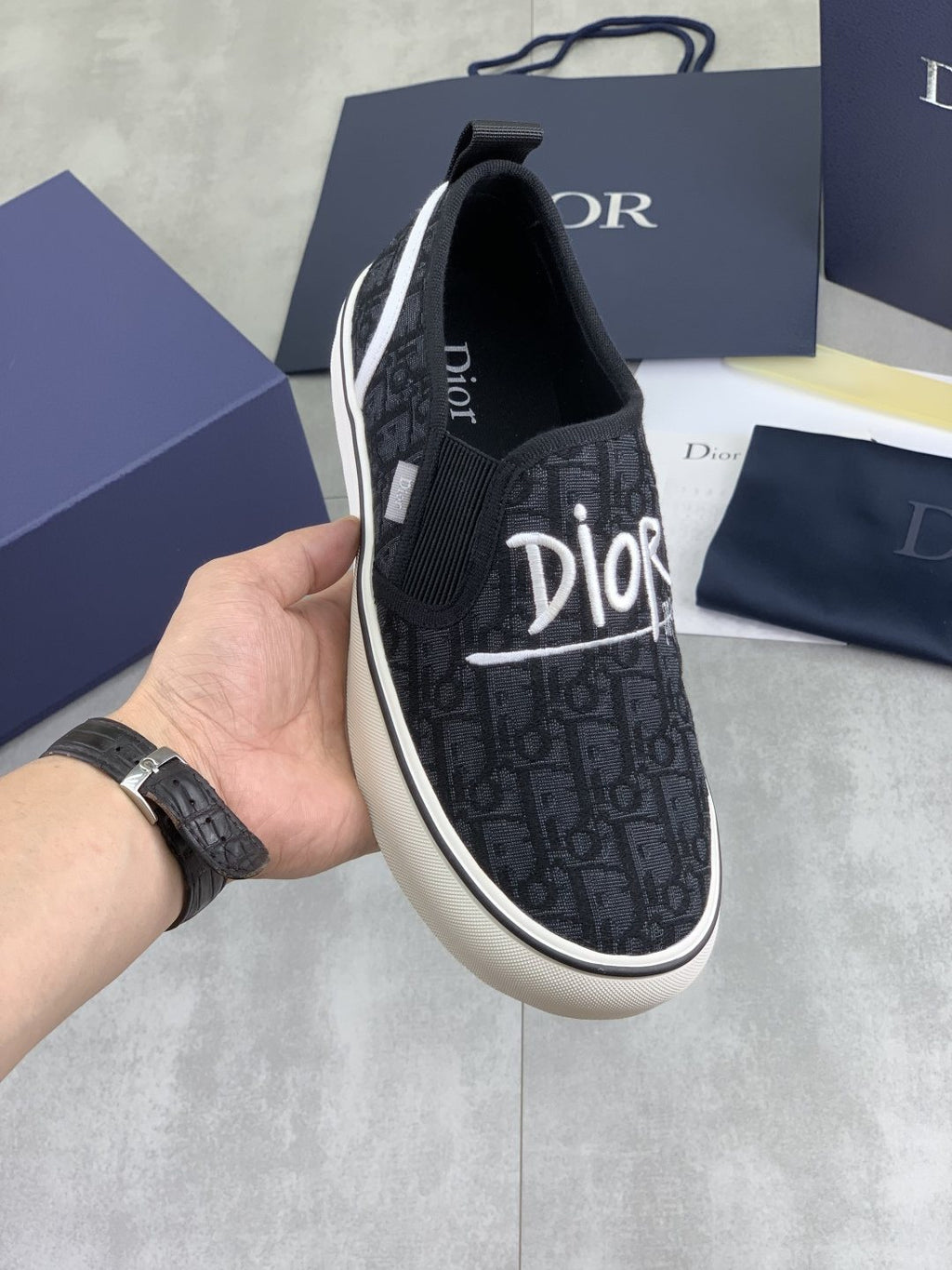 Dior Logo-Pattern Canvas Slip-On Sneakers - Black and White